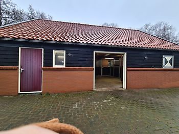 Nieuwbouw van woning met paardenstal Bouwbedrijf E. Roossien Stadskanaal