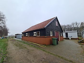 Nieuwbouw van woning met paardenstal Bouwbedrijf E. Roossien Stadskanaal