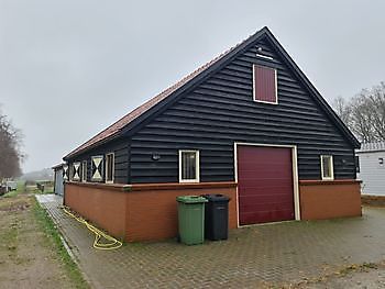 Nieuwbouw van woning met paardenstal Bouwbedrijf E. Roossien Stadskanaal