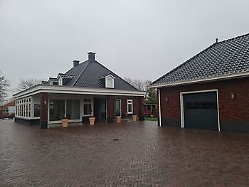 Nieuwbouw van woning met paardenstal Bouwbedrijf E. Roossien Stadskanaal